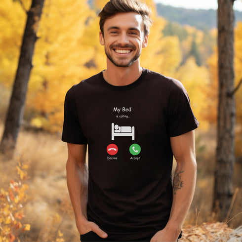 Introducing the ultimate t-shirt for all those who love their bed more than anything else - the My Bed Is Calling tee! Featuring a hilarious stick figure lying in bed, this tee is the perfect way to show off your love for all things cool and comfortable.